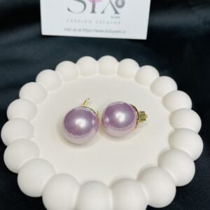 Oversized pearl studs