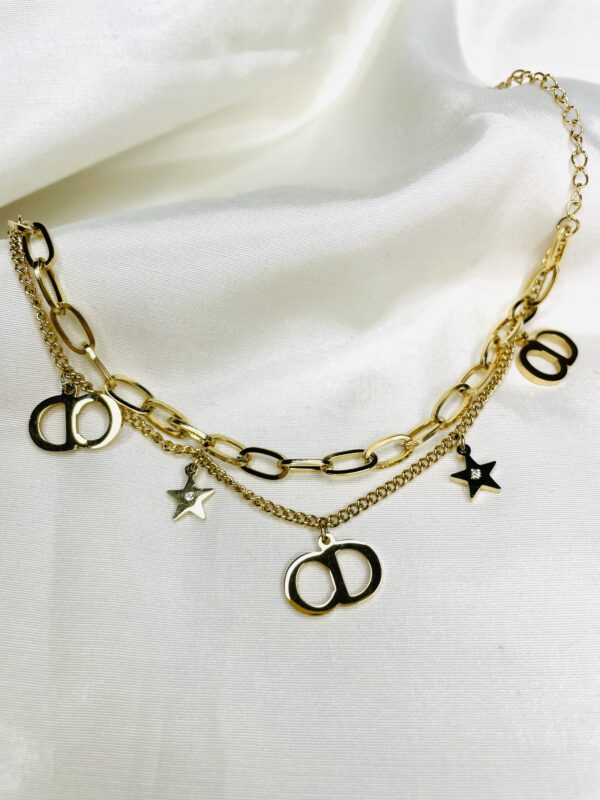 Gold plated stainless steel charm bracelet