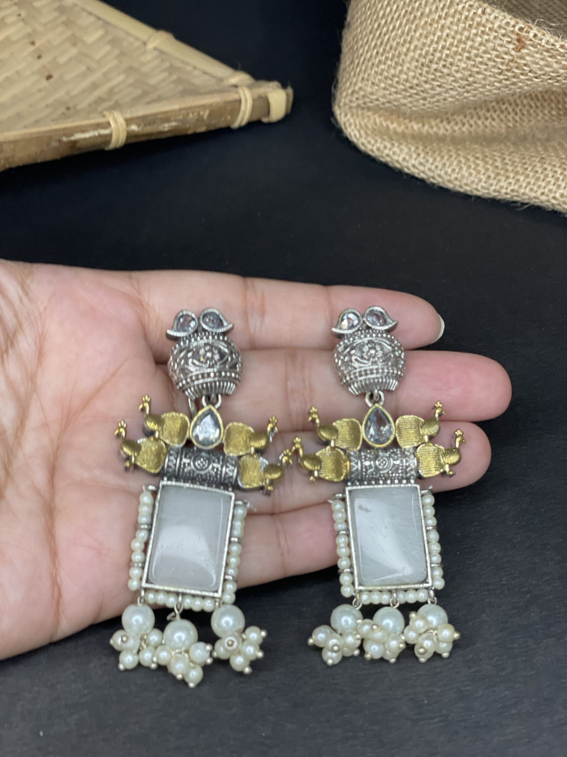Silver replica earrings